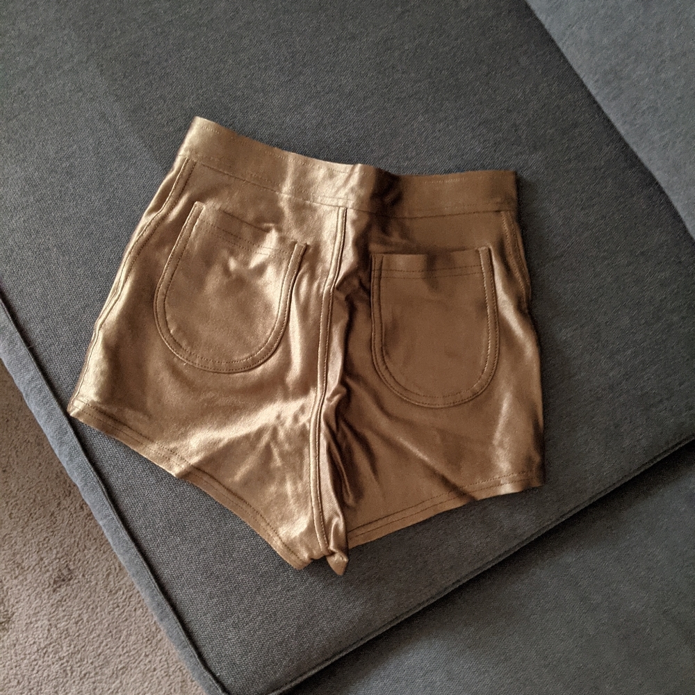 American Apparel gold disco shorts